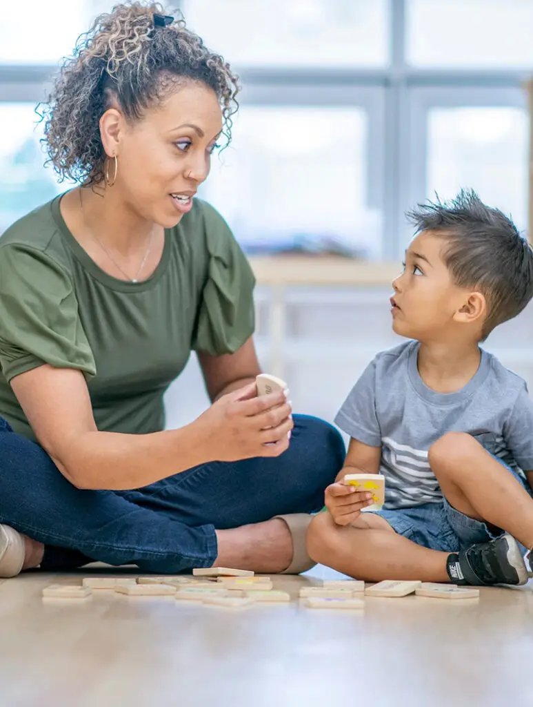 Childcare Worker With Child