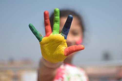 Child with hand paint