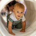 Testimonial 2 Baby Crawling Through Tunnel
